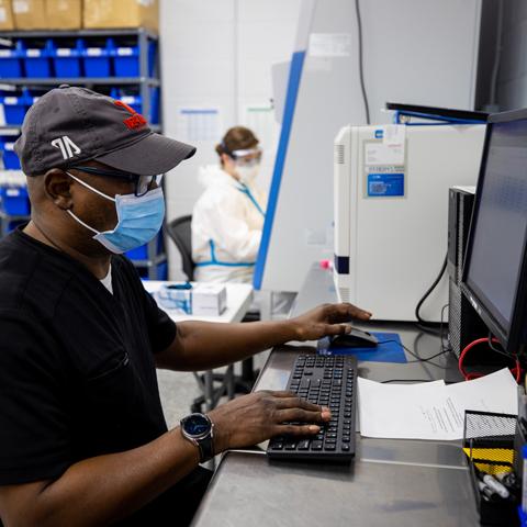 student works at computer in lab